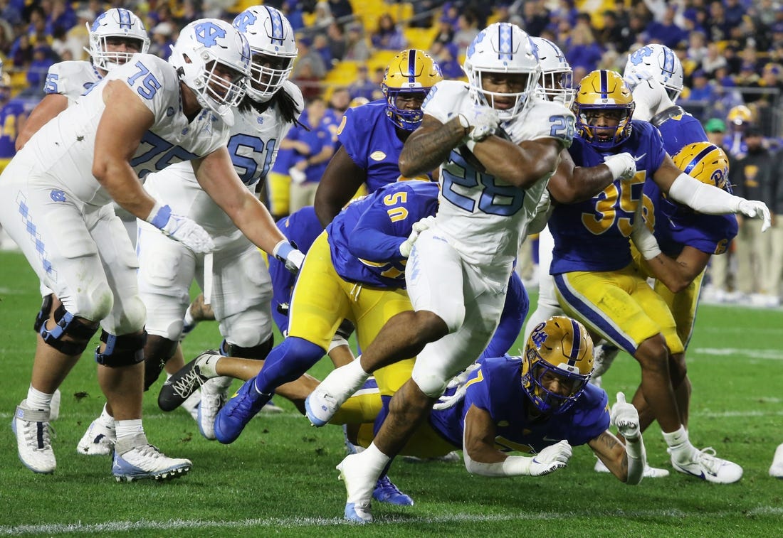 Sep 23, 2023; Pittsburgh, Pennsylvania, USA; North Carolina Tar Heels running back Omarion Hampton (28) crosses the goal line to score a touchdown against the Pittsburgh Panthers during the first quarter at Acrisure Stadium. Mandatory Credit: Charles LeClaire-USA TODAY Sports