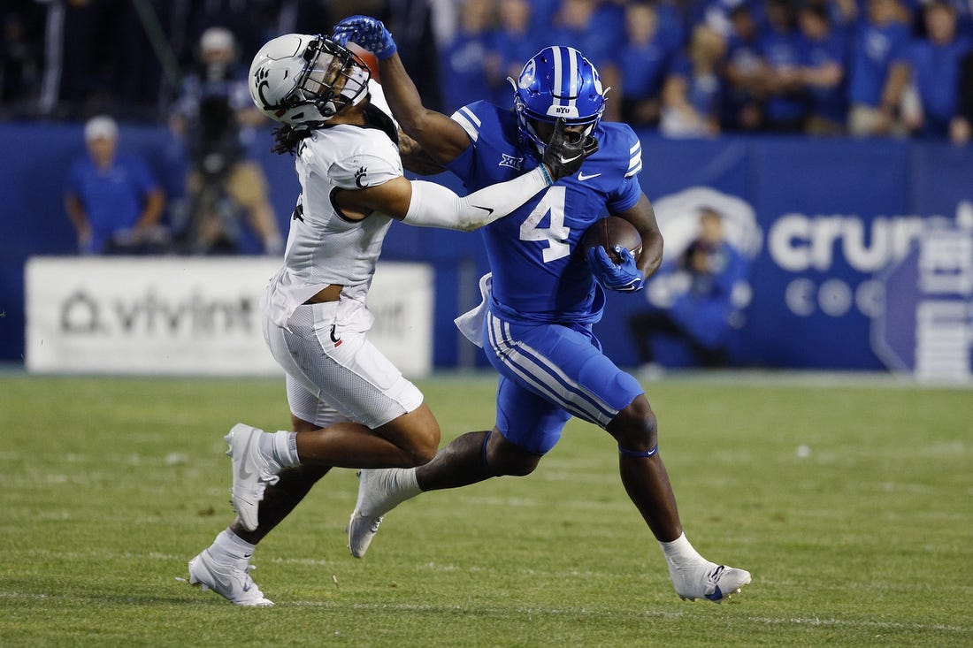 Sep 29, 2023; Provo, Utah, USA; Cincinnati Bearcats safety Deshawn Pace (3) covers Brigham Young Cougars running back Miles Davis (4) in the first half at LaVell Edwards Stadium. Mandatory Credit: Jeff Swinger-USA TODAY Sports