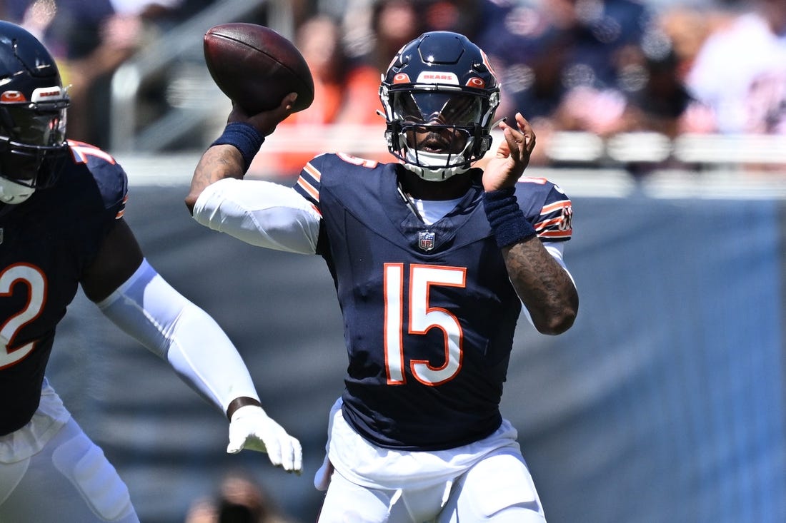 Aug 12, 2023; Chicago, Illinois, USA;  Chicago Bears quarterback P.J. Walker (15) passes against the Tennessee Titans in the first half at Soldier Field. Mandatory Credit: Jamie Sabau-USA TODAY Sports