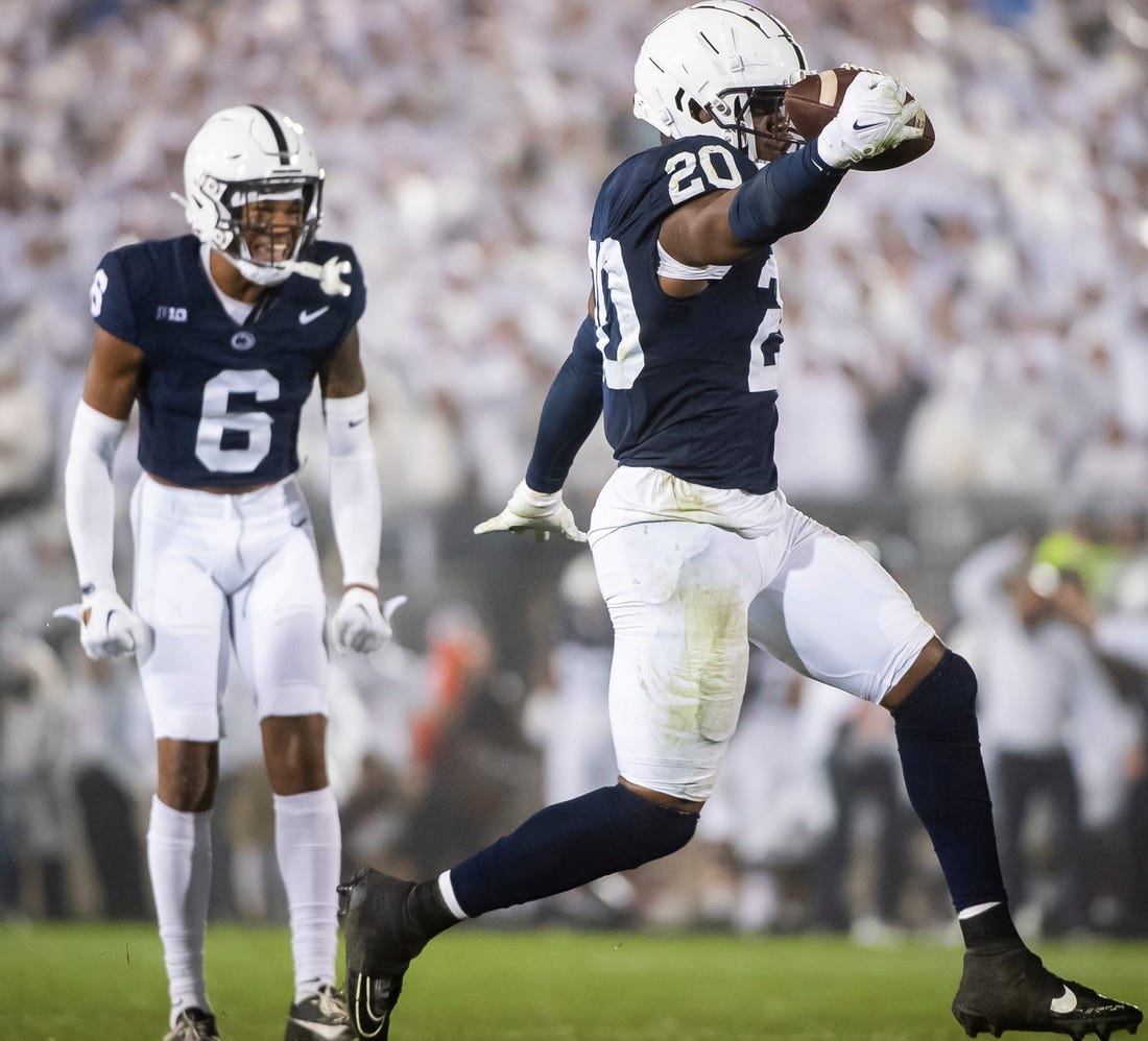 Penn State's Adisa Isaac celebrates after recovering a fumble during a White Out football game against Iowa Saturday, Sept. 23, 2023, in State College, Pa. The Nittany Lions shut out the Hawkeyes, 31-0.