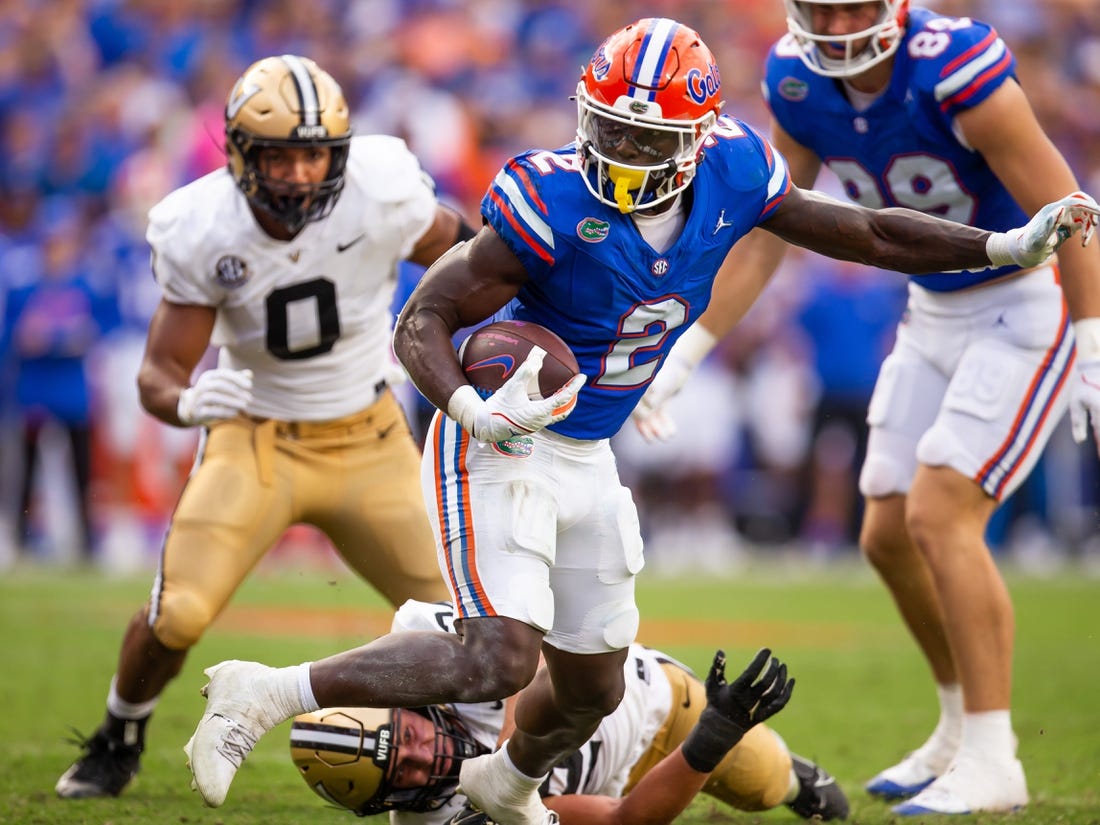 Florida Gators running back Montrell Johnson Jr. (2) drives to the end zone in the first half against Vanderbilt at Steve Spurrier Field at Ben Hill Griffin Stadium in Gainesville, FL on Saturday, October 7, 2023. [Doug Engle/Gainesville Sun]