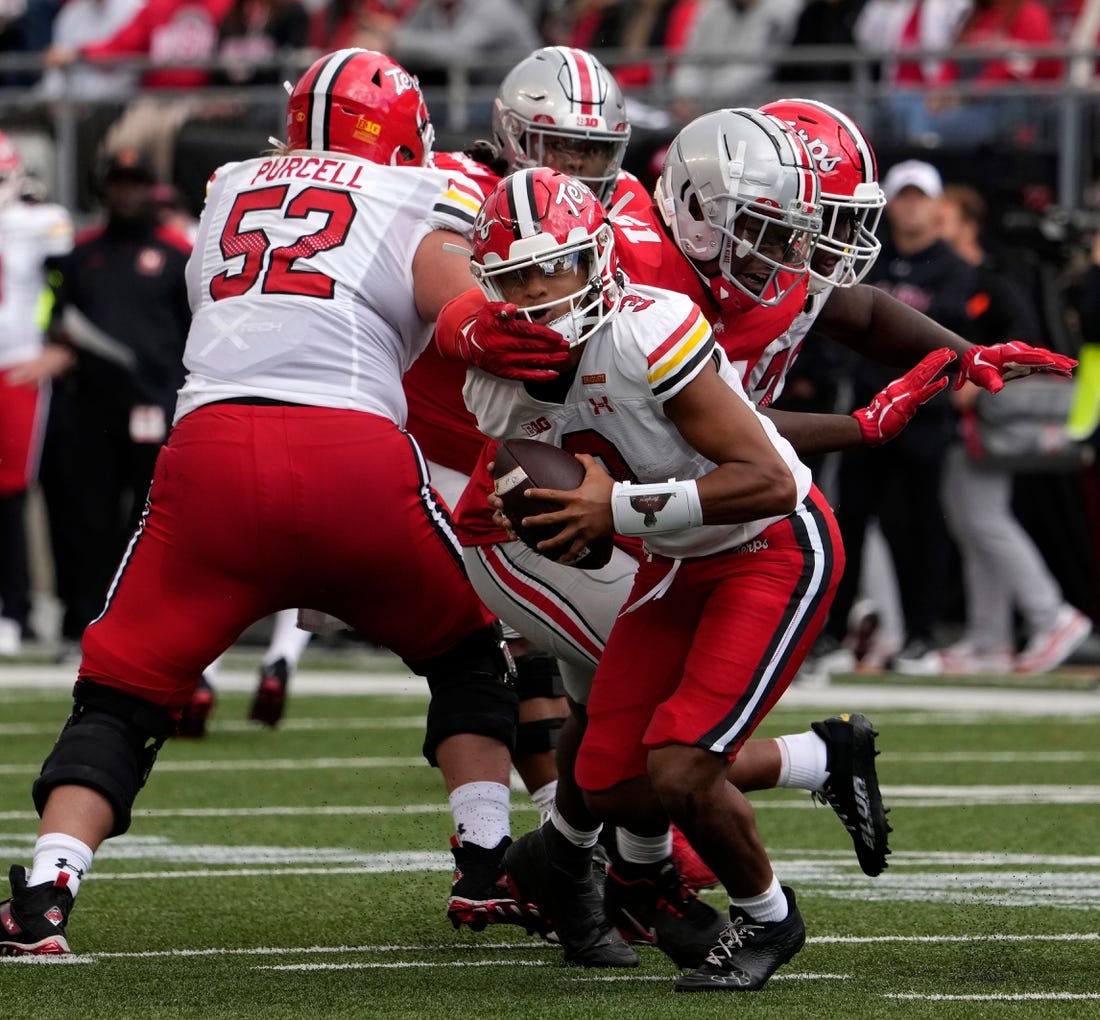 Oct. 7, 2023; Columbus, Oh., USA; 
Maryland Terrapins quarterback Taulia Tagovailoa (3) is nabbed by Ohio State Buckeyes defensive tackle Michael Hall Jr. (51) during the second half of Saturday's NCAA Division I football game at Ohio Stadium.