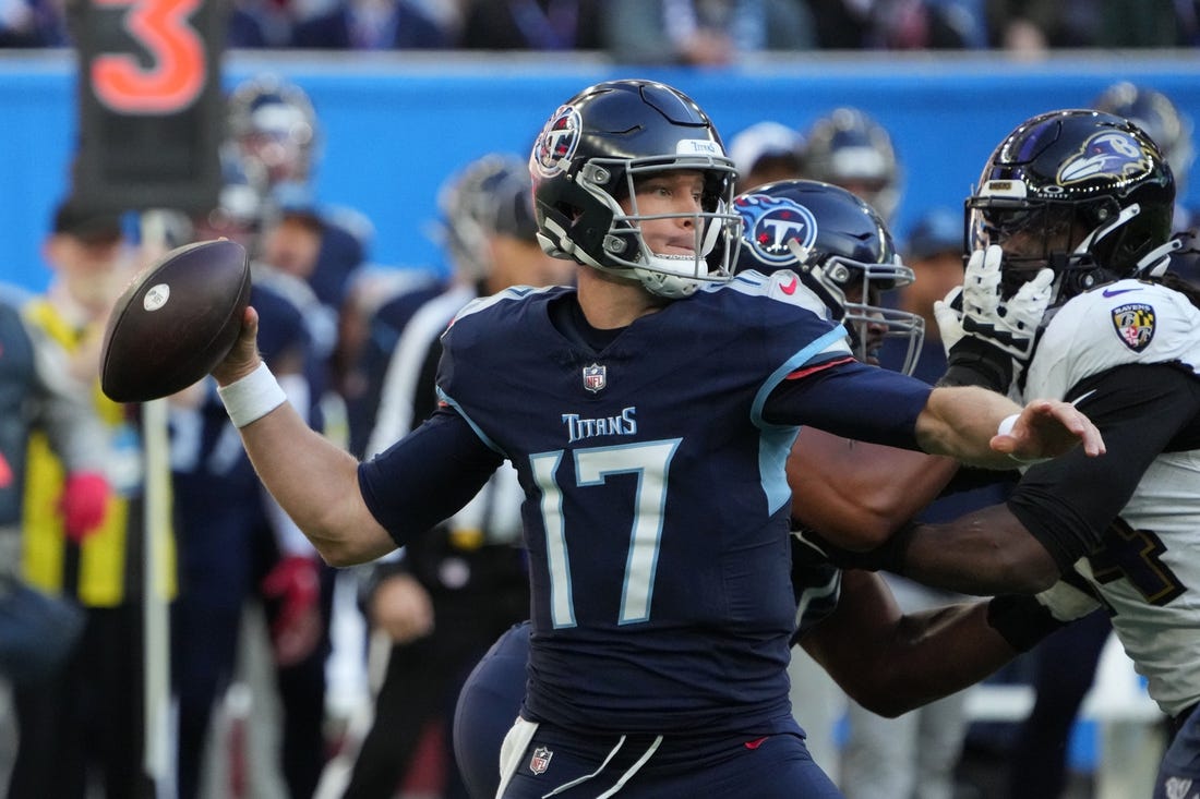 Oct 15, 2023; London, United Kingdom; Tennessee Titans quarterback Ryan Tannehill (17) throws the ball against the Baltimore Ravens in the first half during an NFL International Series game at Tottenham Hotspur Stadium. Mandatory Credit: Kirby Lee-USA TODAY Sports