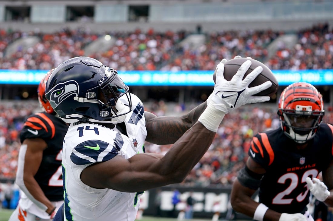 Oct 15, 2023; Cincinnati, Ohio, USA;  Seattle Seahawks wide receiver DK Metcalf (14) catches a pass but is out of bounds near the end zone in the third quarter against the Cincinnati Bengals at Paycor Stadium. Mandatory Credit: Kareem Elgazzar-USA TODAY Sports