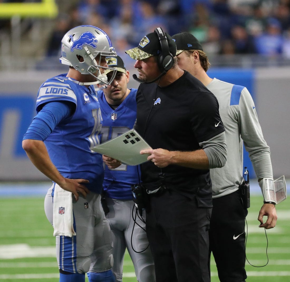 Detroit Lions quarterback Jared Goff (16) and head coach Dan Campbell talk on the sidelines during first half action against the Philadelphia Eagles at Ford Field on Sunday, Oct. 31, 2021.

Detroit Lions