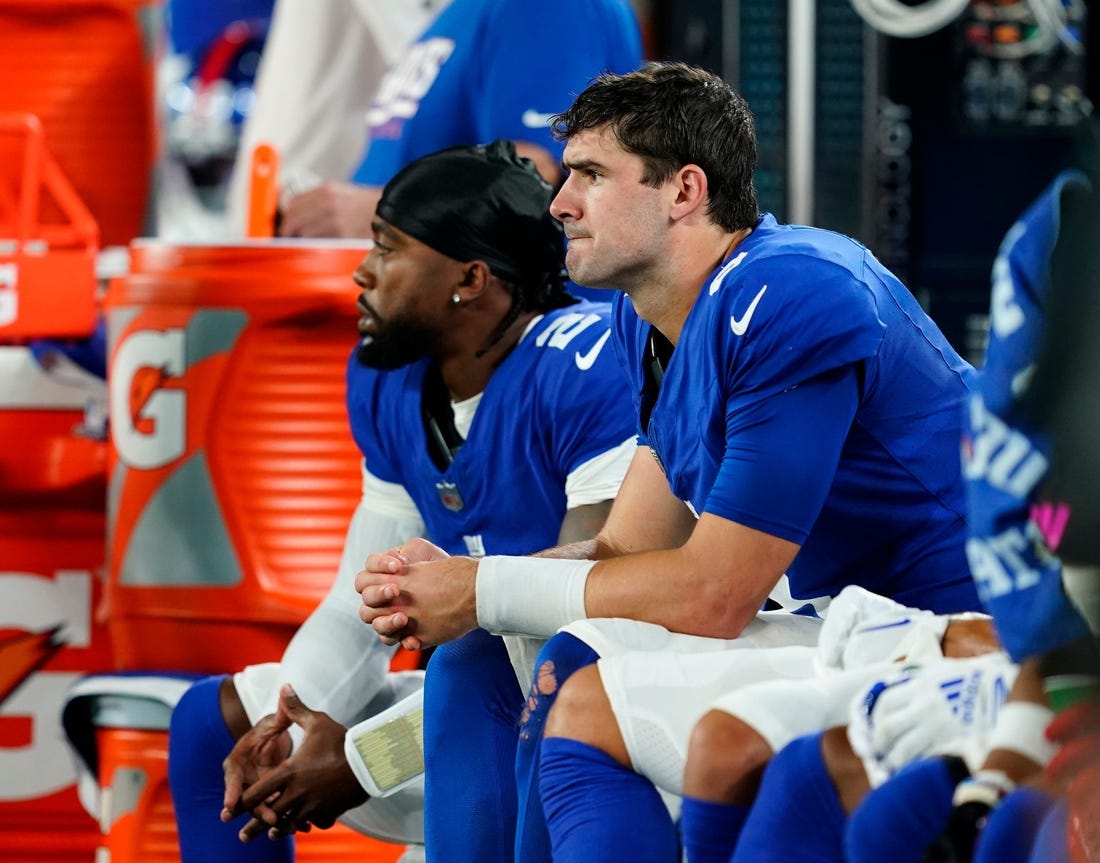 New York Giants quarterback Daniel Jones, right, sits with quarterback Tyrod Taylor (2) in the second half. The Seahawks defeat the Giants, 24-3, at MetLife Stadium on Monday, Oct. 2, 2023, in East Rutherford.