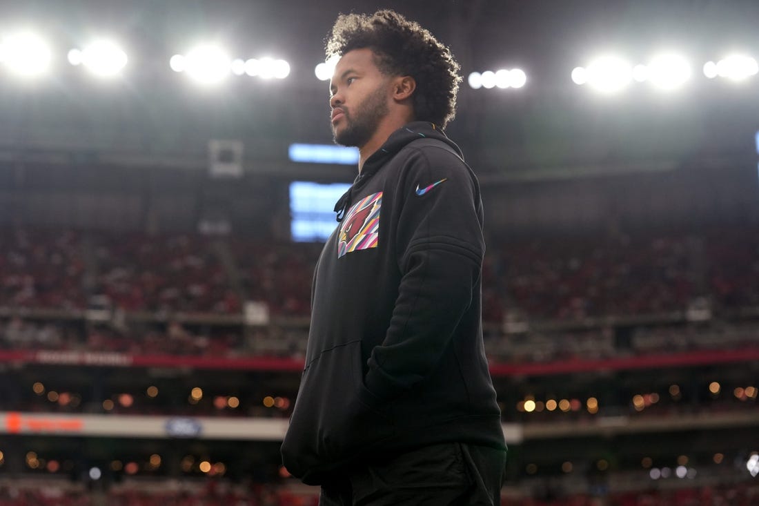 Arizona Cardinals quarterback Kyler Murray watches his team from the sidelines as they play against the Cincinnati Bengals at State Farm Stadium in Glendale on Oct. 8, 2023.