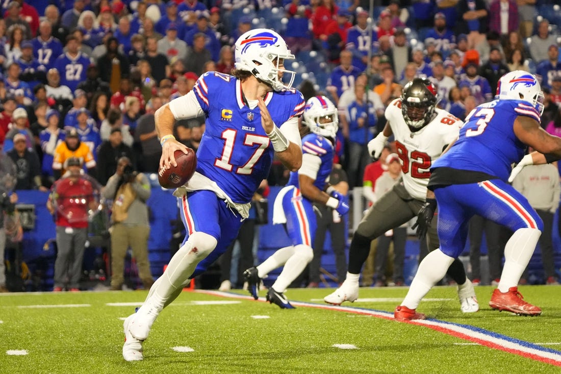 Oct 26, 2023; Orchard Park, New York, USA; Buffalo Bills quarterback Josh Allen (17) runs with the ball against the Tampa Bay Buccaneers during the second half at Highmark Stadium. Mandatory Credit: Gregory Fisher-USA TODAY Sports