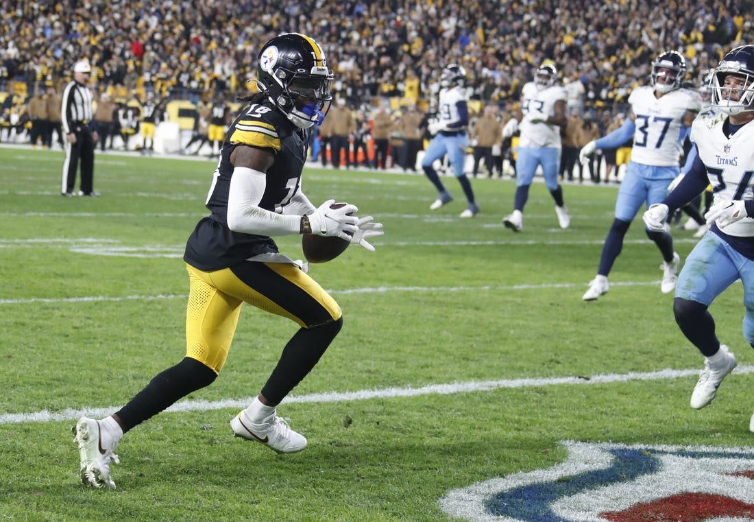 Nov 2, 2023; Pittsburgh, Pennsylvania, USA;  Pittsburgh Steelers wide receiver Diontae Johnson (18) makes the game winning touchdown against the Tennessee Titans during the fourth quarter at Acrisure Stadium. Pittsburgh won 20-16. Mandatory Credit: Charles LeClaire-USA TODAY Sports