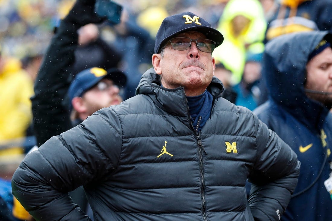 Michigan coach Jim Harbaugh's college football program is being investigated for sign-stealing.
