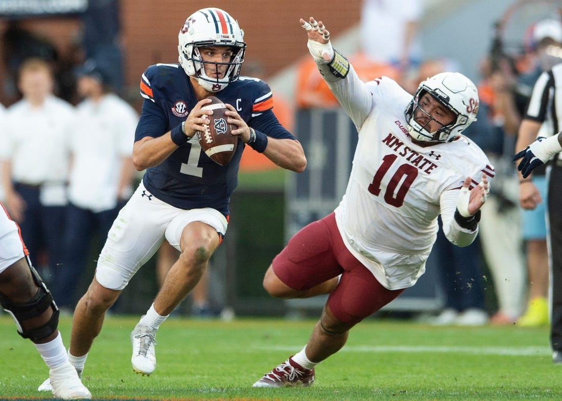 Auburn Tigers quarterback Payton Thorne (1) scrambles up the middle as Auburn Tigers take on New Mexico State Aggies at Jordan-Hare Stadium in Auburn, Ala., on Saturday, Nov. 18, 2023. New Mexico State Aggies leads Auburn Tigers 10-7 at halftime.