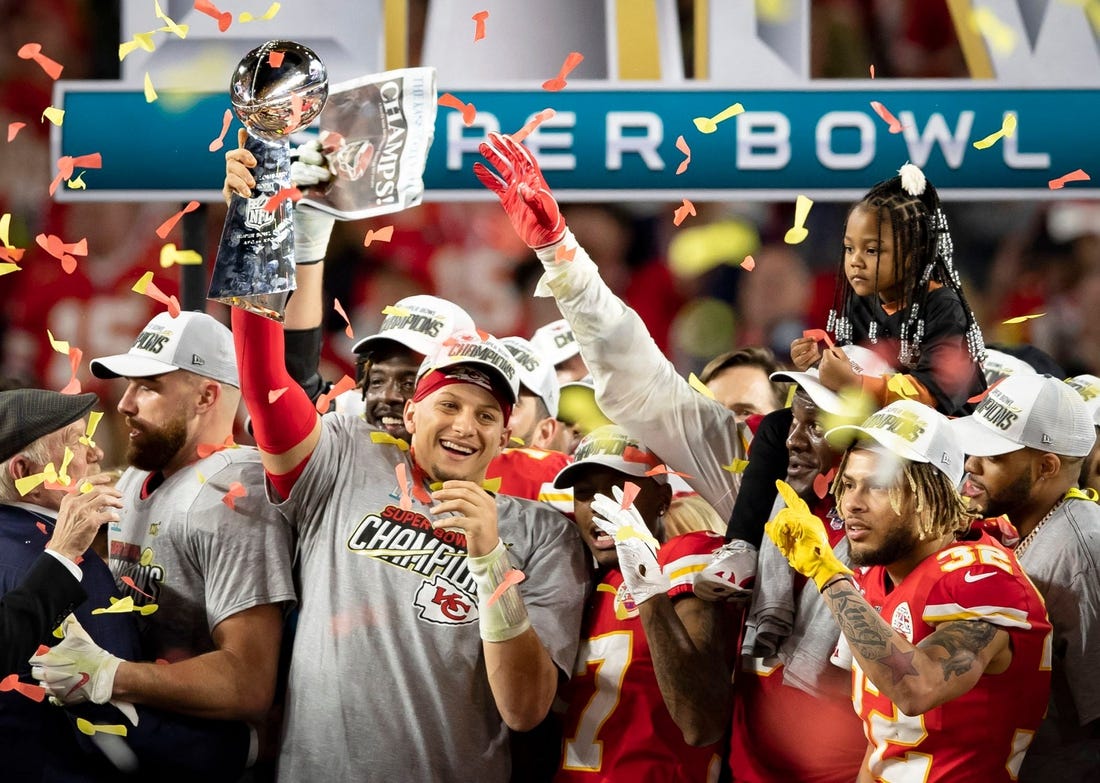 Kansas City Chiefs quarterback Patrick Mahomes (15) celebrates with the Vince Lombardi Trophy after Super Bowl LIV win over the 49ers at Hard Rock Stadium in Miami Gardens, Feb. 2, 2020.  [ALLEN EYESTONE/The Palm Beach Post]

Super Bowl Kansas City Chiefs Vs San Francisco 49ers