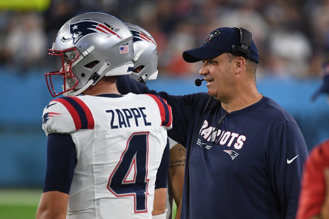 Aug 25, 2023; Nashville, Tennessee, USA; New England Patriots offensive coordinator Bill O'Brien talks with quarterback Bailey Zappe (4) during the first half against the Tennessee Titans at Nissan Stadium. Mandatory Credit: Christopher Hanewinckel-USA TODAY Sports