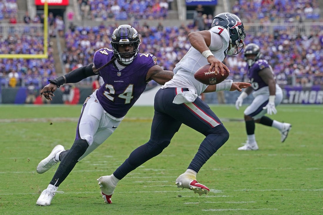 Baltimore Ravens Jadeveon Clowney linebacker (24) pressures Houston Texans quarterback C.J. Stroud (7) in the second quarter at M&T Bank Stadium. Mandatory Credit: Mitch Stringer-USA TODAY Sports