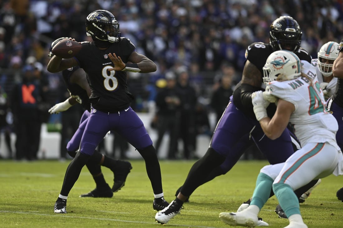 Dec 31, 2023; Baltimore, Maryland, USA;  Baltimore Ravens quarterback Lamar Jackson (8) throws from the pocket during the first half against the Miami Dolphins at M&T Bank Stadium. Mandatory Credit: Tommy Gilligan-USA TODAY Sports