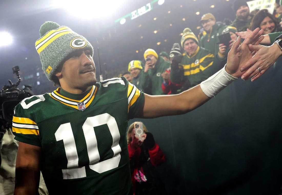 Green Bay Packers quarterback Jordan Love (10) shakes hands with fans following the Packers victory over the Chicago Bears during their football game Sunday, January 7, 2024, at Lambeau Field in Green Bay, Wis. The Packers defeated the Bears 17-9.
