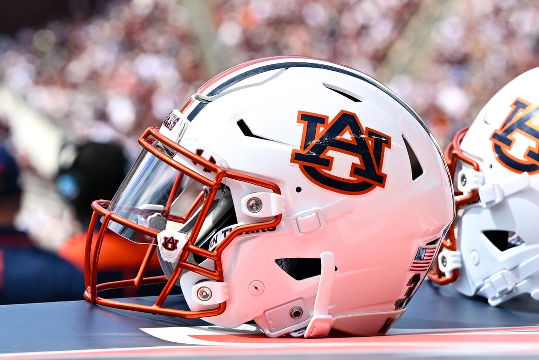 Sep 23, 2023; College Station, Texas, USA; A detailed view of an Auburn Tigers helmet on the sideline of the game against the Texas A&M Aggies at Kyle Field. Mandatory Credit: Maria Lysaker-USA TODAY Sports