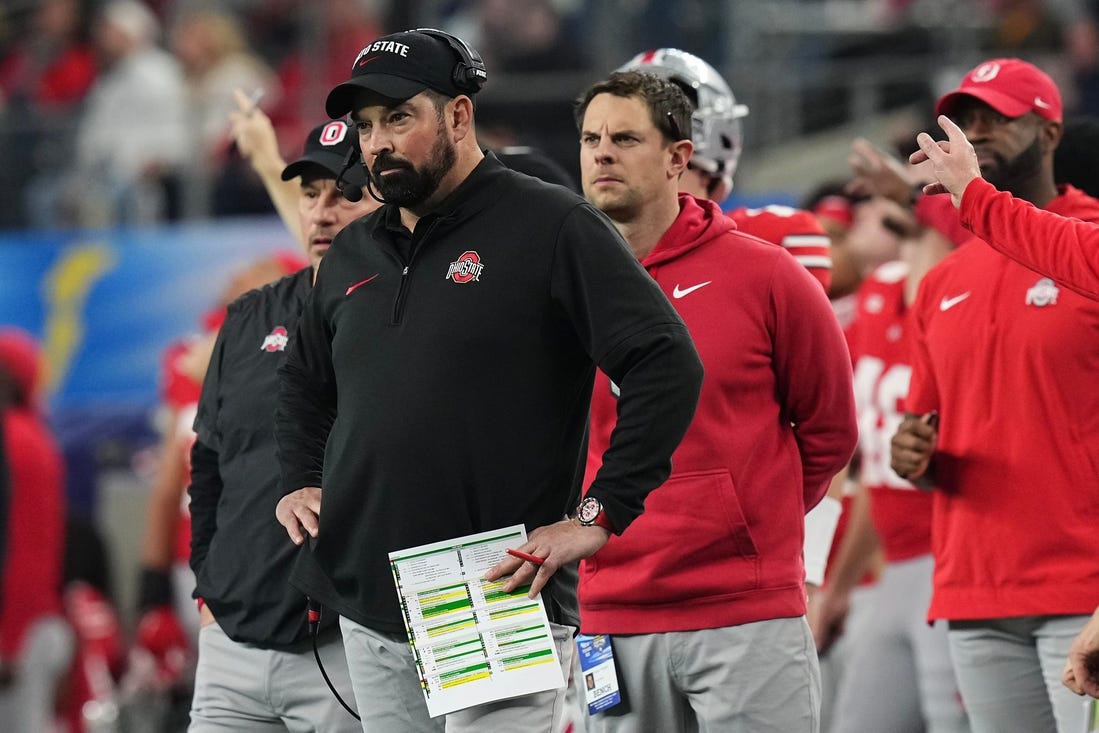 Dec 29, 2023; Arlington, Texas, USA; Ohio State Buckeyes head coach Ryan Day watches during the second quarter of the Goodyear Cotton Bowl Classic against the Missouri Tigers at AT&T Stadium.