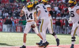 Projected top-50 picks Michigan quarterback J.J. McCarthy (9) and wide receiver Roman Wilson (14), pictured celebrating during a touchdown against Ohio State the second half at Ohio Stadium in 2022.