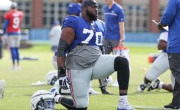 Aug 1, 2023; East Rutherford, NJ, USA; New York Giants offensive tackle Korey Cunningham (70) stretches during training camp at the Quest Diagnostics Training Facility.  Mandatory Credit: Vincent Carchietta-USA TODAY Sports
