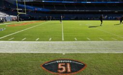 Oct 22, 2023; Chicago, Illinois, USA; A general view of a logo painted on the sideline to honor the memory of former Chicago Bear and Hall of Famer Dick Butkus before a game between the Las Vegas Raiders and the Chicago Bears at Soldier Field. Mandatory Credit: Jamie Sabau-USA TODAY Sports