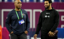 Mar 2, 2024; Indianapolis, IN, USA; Chicago Bears quarterbacks coach Kerry Joseph talks to Southern California quarterback Caleb Williams (QB14) during the 2024 NFL Combine at Lucas Oil Stadium. Mandatory Credit: Kirby Lee-USA TODAY Sports