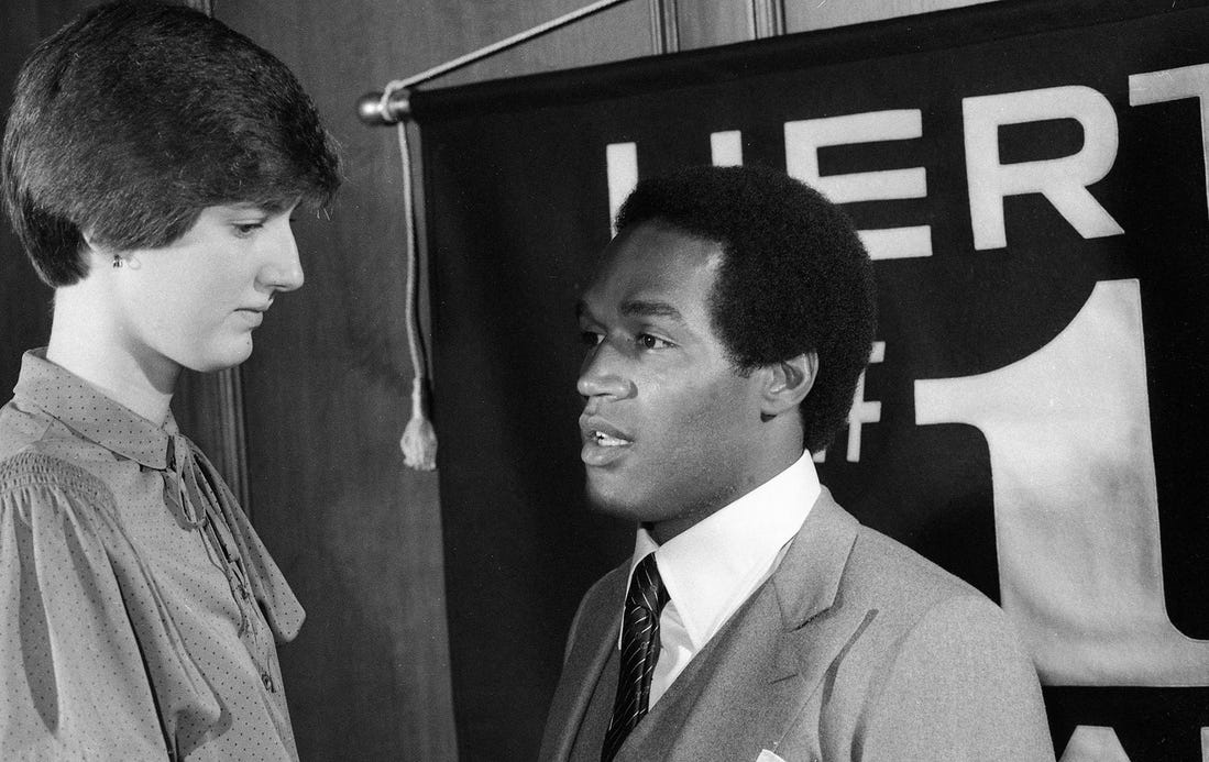 Anne Donovan of Paramus Catholic High School talking with San Francisco 49ers running back and Hertz spokesman O.J. Simpson on July 11, 1979, at the Hertz #1 Award dinner in New York City. Fifty state winners were honored for their achievement.