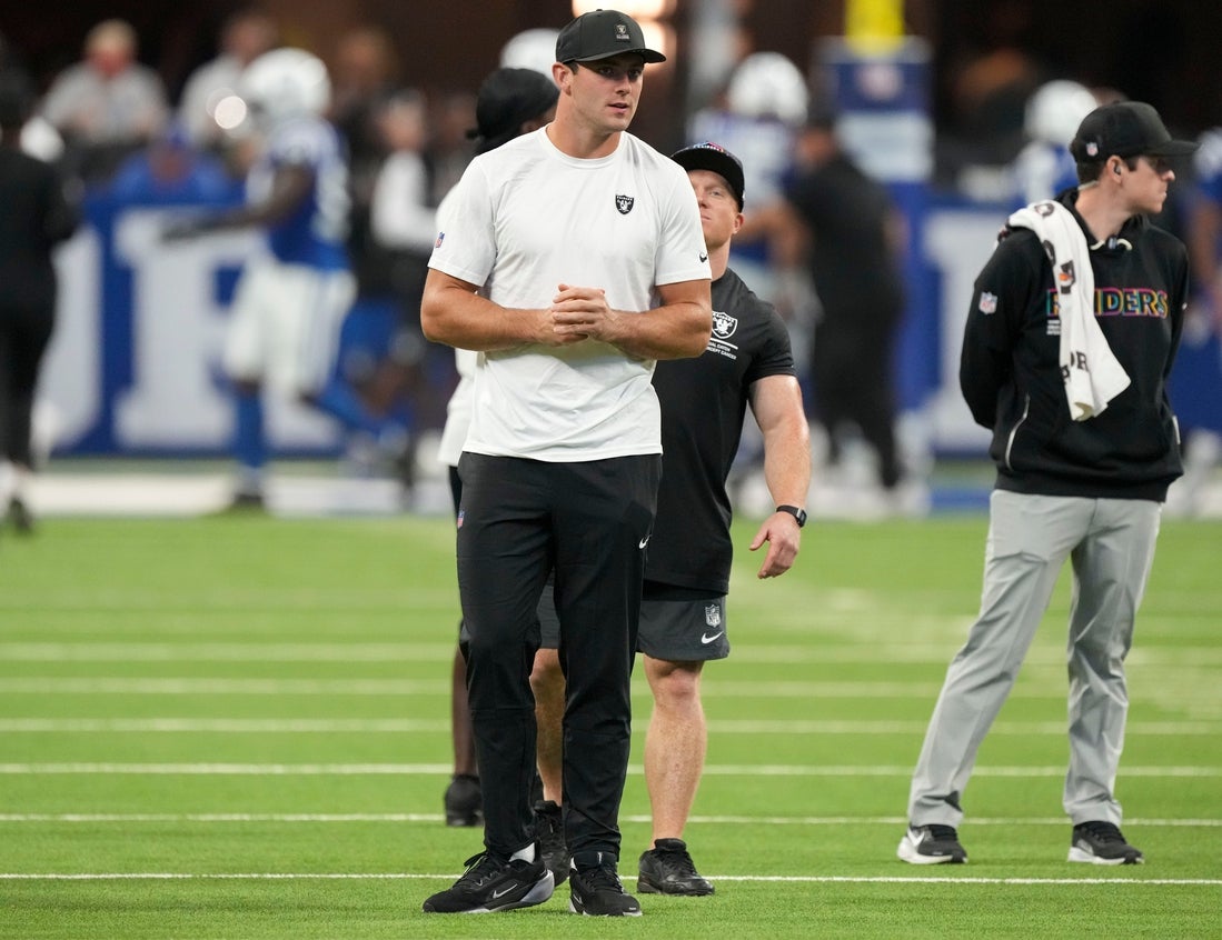 Oct 5, 2025; Indianapolis, Indiana, USA; Las Vegas Raiders tight end Brock Bowers (89) watches warm ups before a game against the Indianapolis Colts at Lucas Oil Stadium. Mandatory Credit: Christine Tannous-USA TODAY Network via Imagn Images